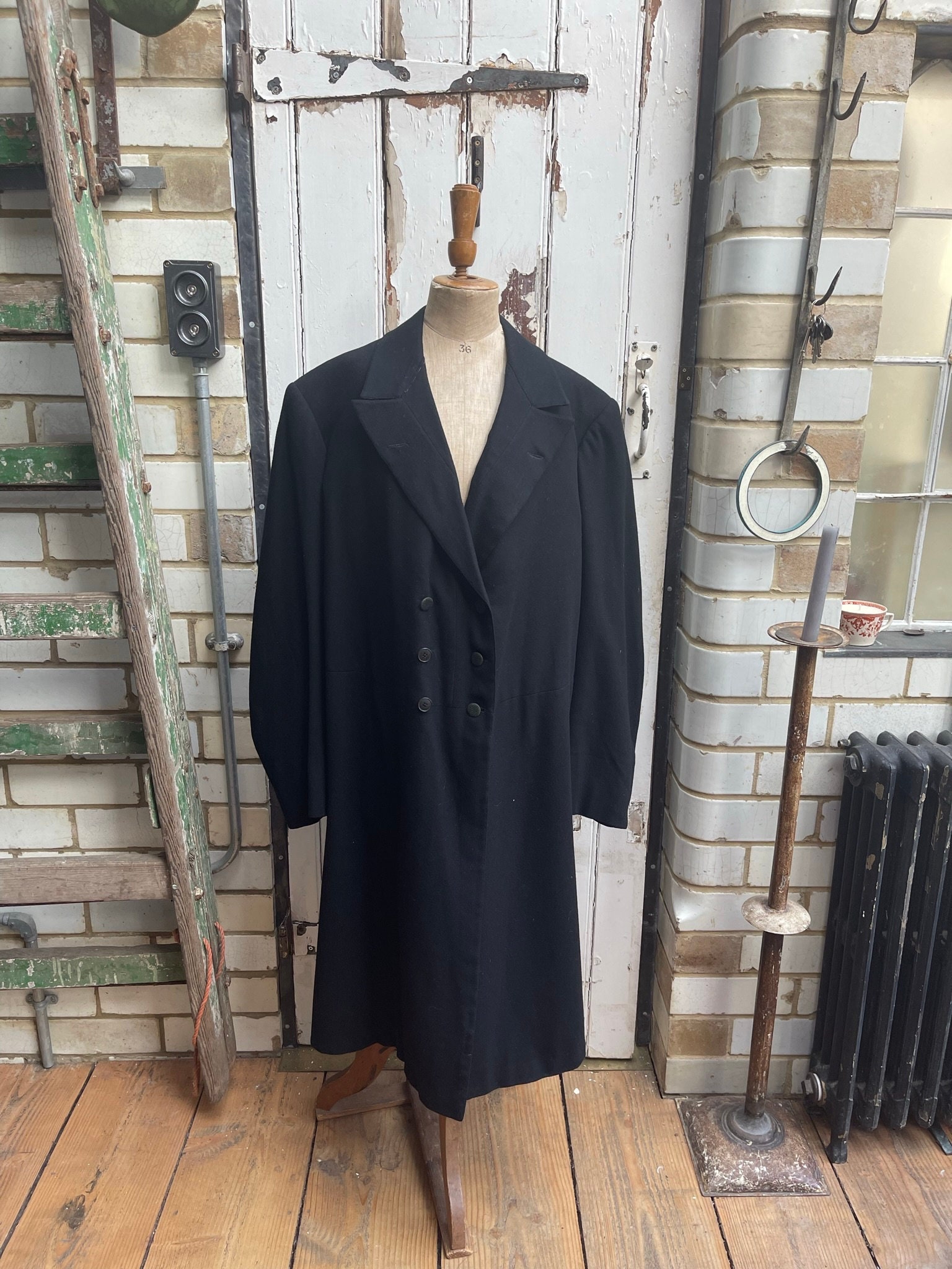 long black funeral coat