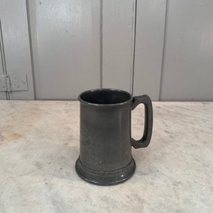 Antique pewter tankard with glass base prize for football sixes dated 1902