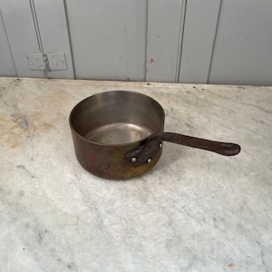 Antique French copper small size saucepan with cast iron handle