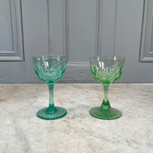 Non-matching pair antique green uranium faceted wine glasses