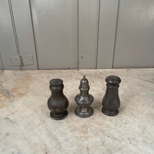 3 antique pewter shakers - display only