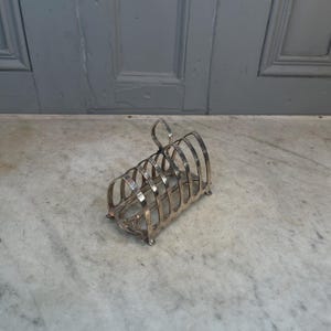 Antique Gothic style silver plated toast rack