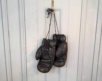 Antique vintage pair of leather boxing gloves - display only