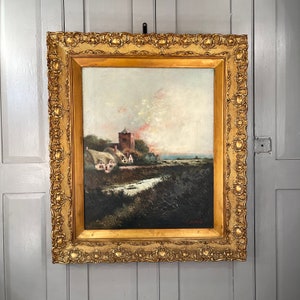 Large antique coastal landscape oil painting in ornate gesso frame signed E Maybery