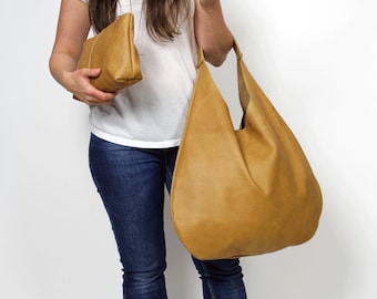 Bolso hobo de piel marrón camel: bolso de mano extragrande para uso diario con bolsillo.
