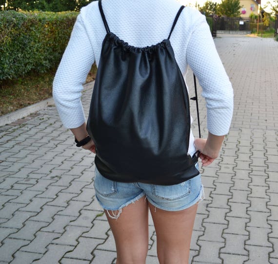 black leather drawstring backpack  Duluth Pack This artisanal product is made of genuine leather Piel Leather Top Flap Drawstring