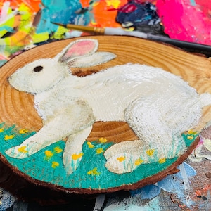 Snowshoe Bunny wood-slice painting