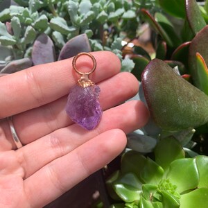 Raw amethyst pendant with copper