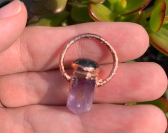 Amethyst point topped with labradorite with copper