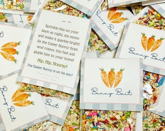 May include: A close-up of several small bags filled with colorful sprinkles and oats. The bags have a blue and white checkered pattern and a label that says "Bunny Bait". The label also features a watercolor illustration of three carrots.