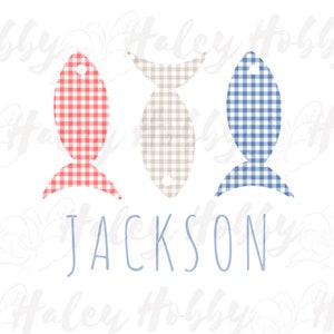 May include: Three fish-shaped ornaments with gingham patterns in red and white, tan and white, and blue and white. The name "JACKSON" is written in blue below the ornaments.