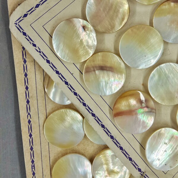 12 vintage buttons in mother of pearl shade yellow/white 28 mm on original sale carton