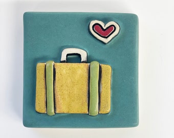 clique tile - suitcase