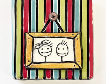 clique tile - frame family
