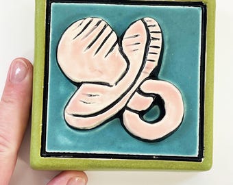 clique tile - pink pacifier