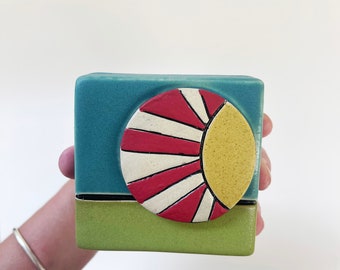 clique tile - modern sun