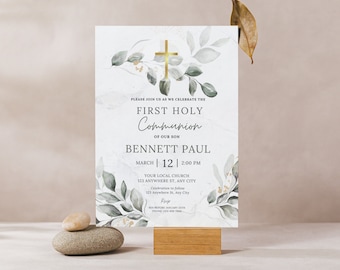 May include: A watercolor invitation with a gold cross and green leaves. The text reads "Please join us as we celebrate the First Holy Communion of our son Bennett Paul March 12 2:00 PM Your Local Church 123 Anywhere St, Any City Celebration to follow 123 Anywhere St. Any City RSVP MIA before January 25th Phone-430-800".