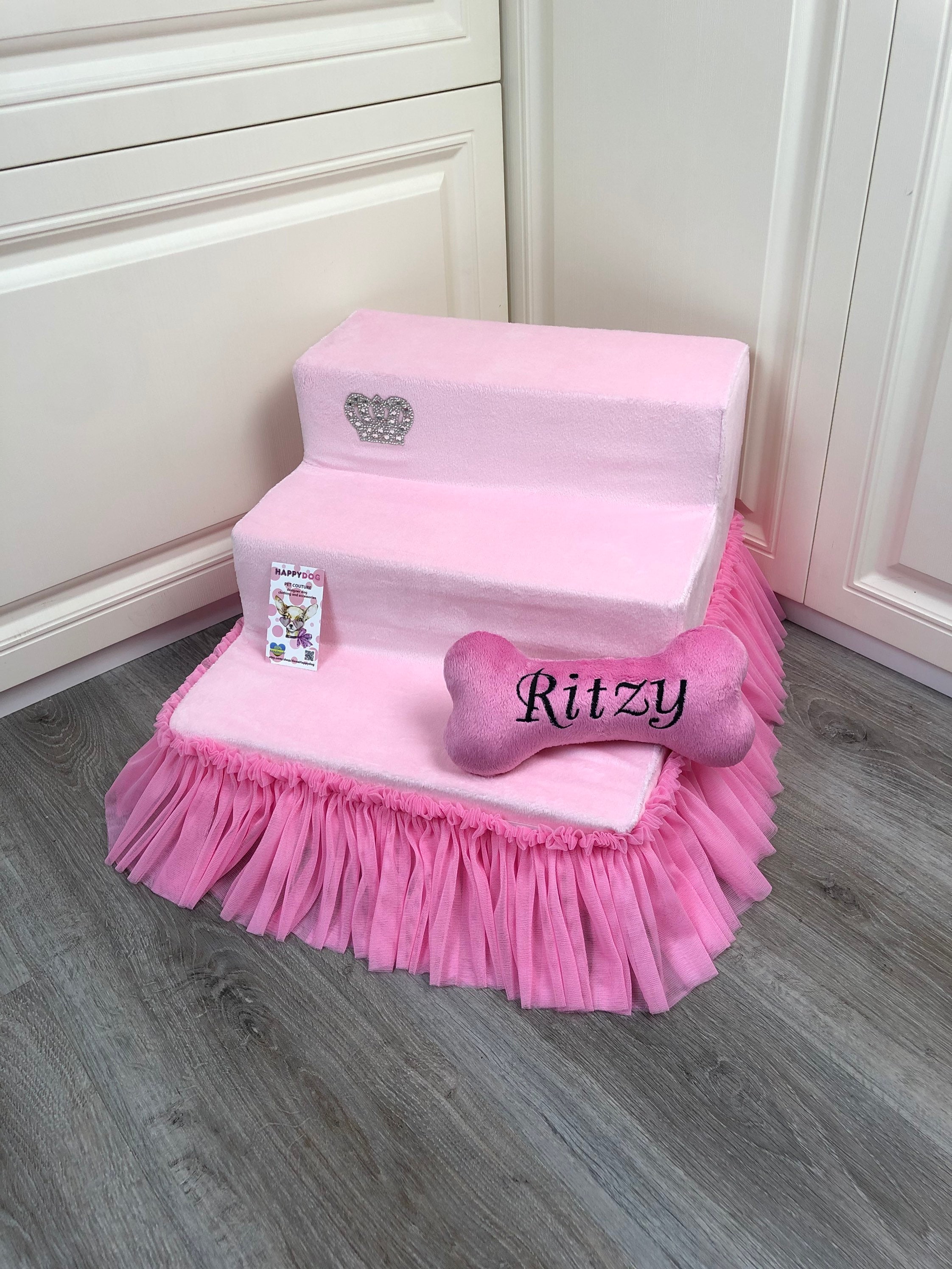 Pink dog stairs 2025