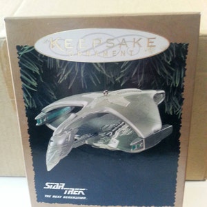 Vintage Star Trek Hallmark Ornament, Next Generation Romulan Warbird Light Ornament with original box.