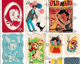 May include: A set of vintage playing cards featuring colorful illustrations of various characters and scenes. The cards include a dog, a rabbit, a heart, a man blowing bubbles, a woman with a cat, and a circus tent. The cards are printed on thick cardstock and have a slightly worn look.