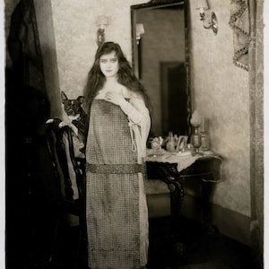 Photo of Theda Bara and a dog