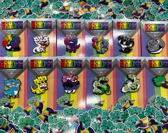 Puede incluir: Un conjunto de 10 pines de esmalte con diseños coloridos de hidras de múltiples cabezas. Los pines están dispuestos sobre un fondo de pegatinas de colores arcoíris. Los pines son de diferentes colores y tienen diferentes diseños. Los pines tienen aproximadamente 2,5 cm de diámetro.