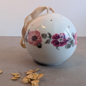 French 1970s PORCELAINE DE PARIS pomander, porcelain potpourri holder decorated with pink flowers.