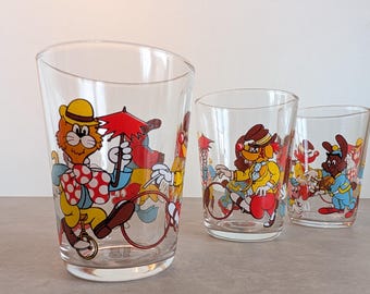 Set of 3 1980s French children's drinking glasses, with circus animals performing a clown act, vintage children's party glasses.