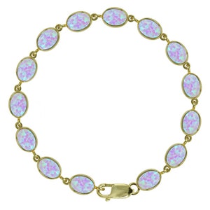 May include: A gold chain bracelet with oval-shaped iridescent opal stones.