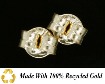 May include: Two gold-toned earring backs, made with 100% recycled gold. The backs are designed to secure earrings in place.