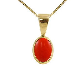 Può includere: Una collana con catena d'oro con un ciondolo con una pietra di corallo rossa di forma ovale.