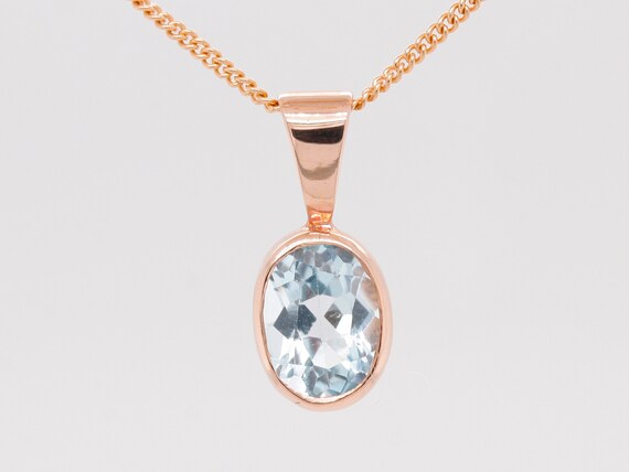 オーバルスイスブルートパーズソリティアペンダント、トリオダイヤモンド付き|プラチナ|彼女の為にジュエリーギフト並行輸入 オーバルスイスブルートパーズソリティアペンダント、トリオ