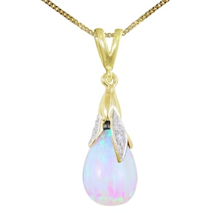 May include: A delicate gold necklace with a teardrop-shaped opal pendant. The pendant is surrounded by small diamonds and has a floral design.