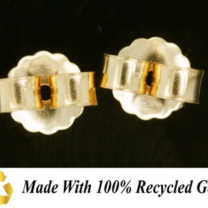 May include: Two gold-toned earring backs, made with 100% recycled gold. The backs are designed to secure earrings in place.