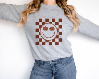 Pumpkin Smiley Crewneck Sweatshirt | Checker Trend Shirt | Fall Graphic Apparel | Autumn Clothes | Heavy Cotton Comfies