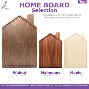 May include: Three house-shaped wooden cutting boards in walnut, mahogany, and maple. The walnut board is 17" x 12" x 0.75", while the mahogany and maple boards are 12" x 9" x 0.75". Each board features a juice groove and a chimney-like extension.