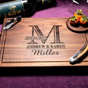 Handmade from natural hardwood personalized cutting board.Never stained, 100% food safe,only finished with food grade mineral oil and beeswax.12x9 inches Walnut Wooden board with central design number 003 with initial,date,first names, and last name.