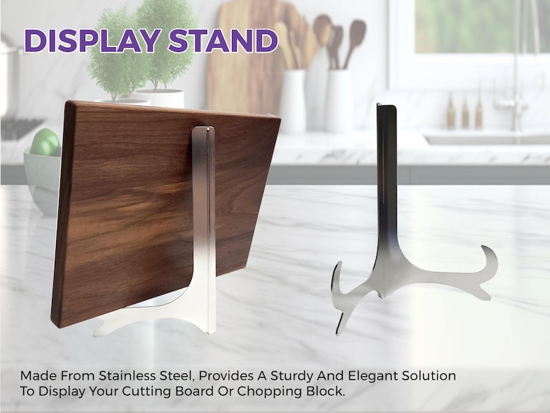May include: A silver-colored stainless steel display stand with a curved base and a vertical support arm. One stand is shown supporting a rectangular dark brown wooden cutting board, while a second identical stand is shown standing empty.