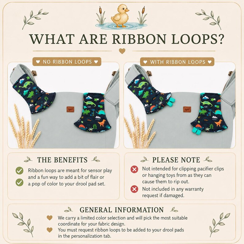 May include: A product comparison image shows a baby carrier with and without ribbon loops. The carrier is gray, and the drool pads feature a dark blue dinosaur pattern. Text explains the benefits and notes about the loops.