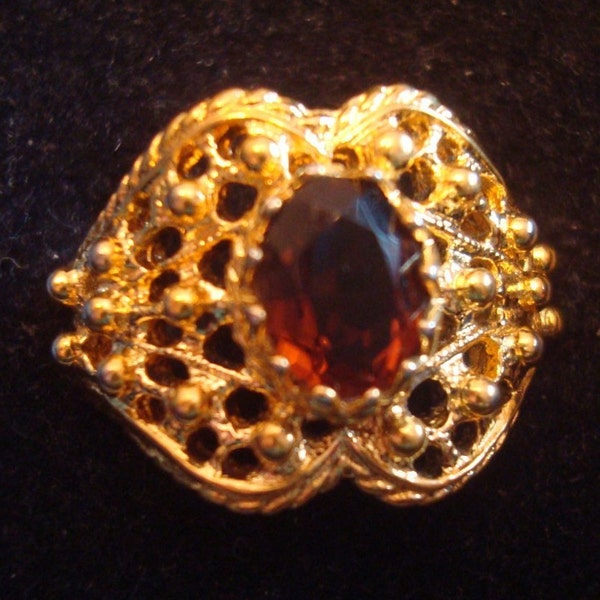 Signed Vargas  18 KT H.G.E. Oval shaped  Amber Stone Ring