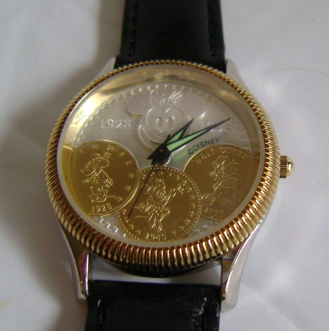 希少なディズニー ミニーの 65 周年記念腕時計 1928-1993 / 新品同様