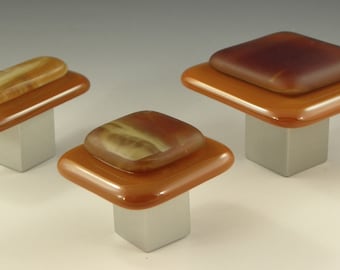 Tahquamenon knobs and pulls, amber / carmel / cream / chestnut colors, matte over gloss finish, suite of 3 knobs and 4"cc, 12"cc pulls