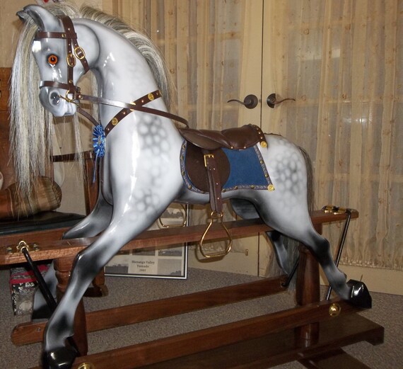 gliding rocking horse