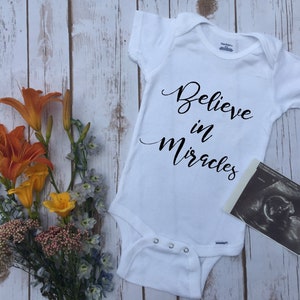 Believe in Miracles Onesie®-Pregnancy Reveal-Pregnancy Announcement-Unisex Baby Clothes-Miracle Baby-IVF baby-Long Wait-Miracles Onesie®