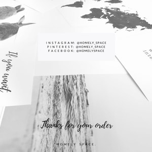May include: A black and white image of a world map with the text "HOMELY SPACE" in a circle. The text "every day with intention." is also included. The image is on a white background.