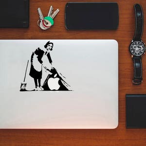 Banksy Cleaning Lady - Macbook Vinyl Decal Sticker / Laptop Decal / iPad Sticker