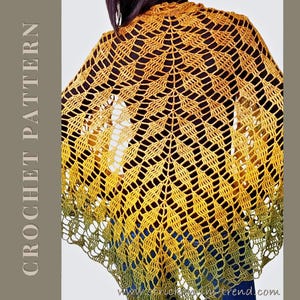 May include: A handmade, open-weave crochet shawl in shades of gold and olive green. The shawl features a leaf-like pattern and is draped over the shoulders. The words "CROCHET PATTERN" are printed vertically on the left side of the image.