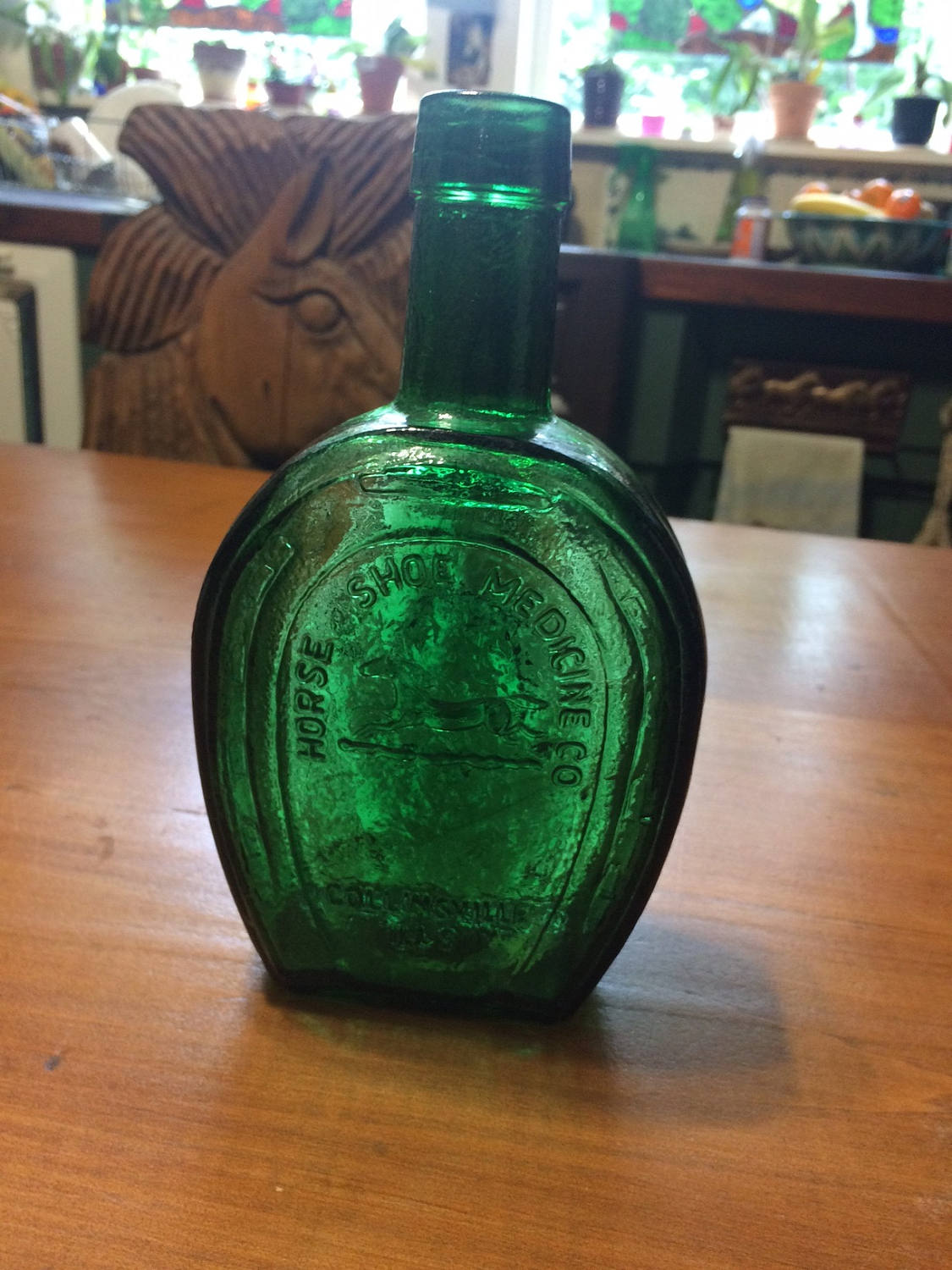Antique Apothecary Green Glass Embossed Medicine Bottle with Horse Head & Running Horse Horse