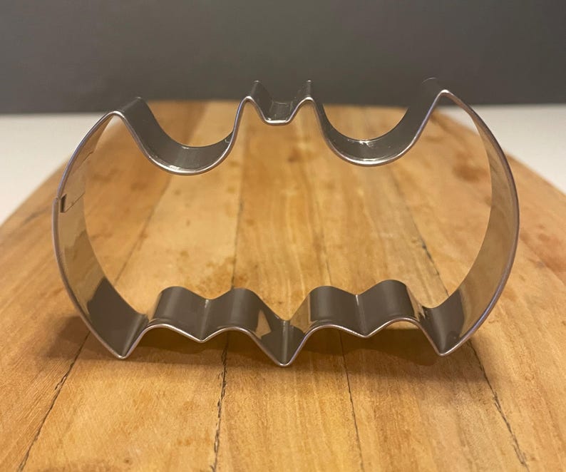 Create stunning bat-shaped cookies and decorations with this durable cutter! Designed for precision, this cutter is perfect for shaping fondant, pastries, clay, and more. Whether you’re making treats for a comic-inspired party, a spooky Halloween event, or simply love gothic aesthetics, this cutter is an essential tool. Its sturdy metal construction ensures long-lasting use, making baking and crafting even more fun and creative!