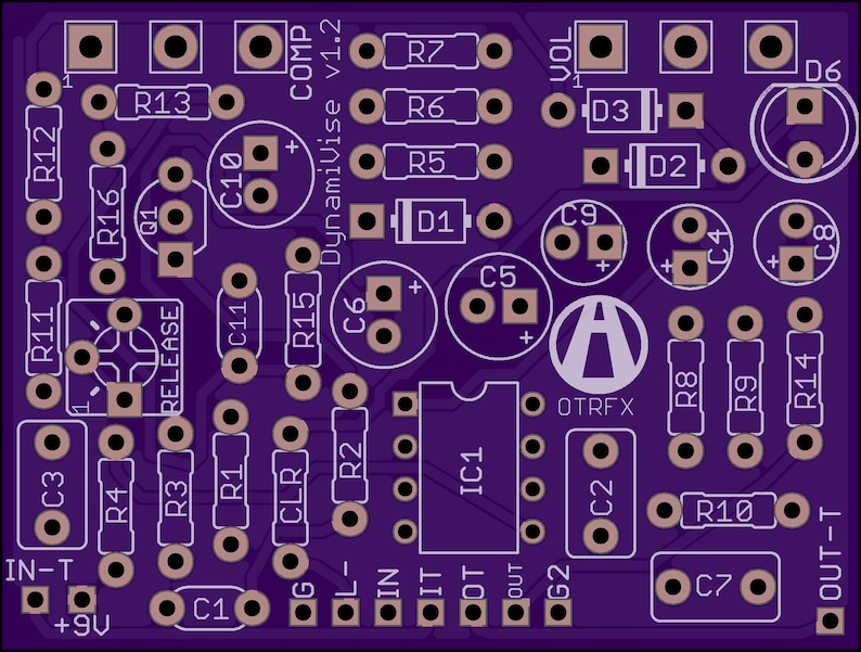 May include: A purple circuit board with white text and components. The board is labelled with text including "COMP DynamiVise v1.2", "RELEASE", and "OTRFX". It features numerous circular and square pads for soldering electronic components.